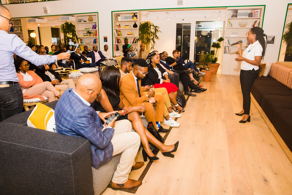 Vuyiswa Mutshekwane address a meeting of the Young Professionals Forum